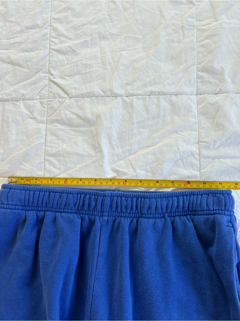 The North Face Men's Royal Blue Athletic Shorts with Red Logo